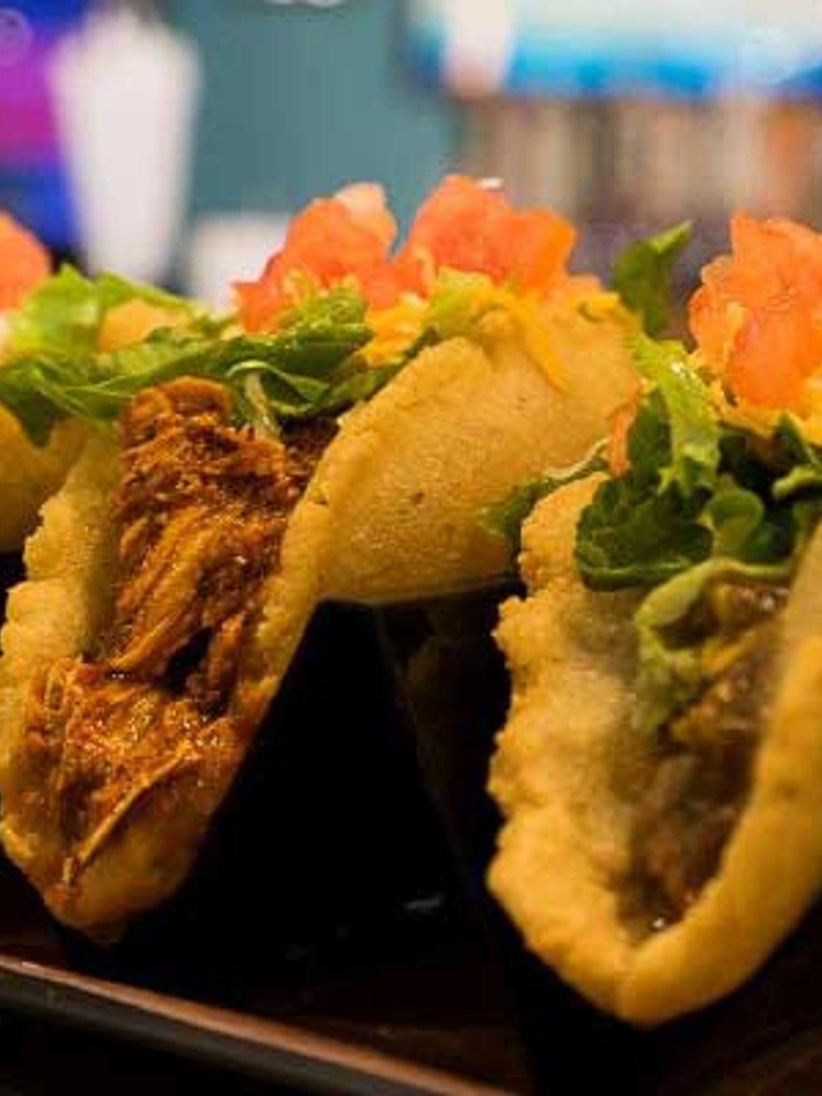 Before: flat phone photo of a beef taco platter with dull brown salsa under harsh kitchen light